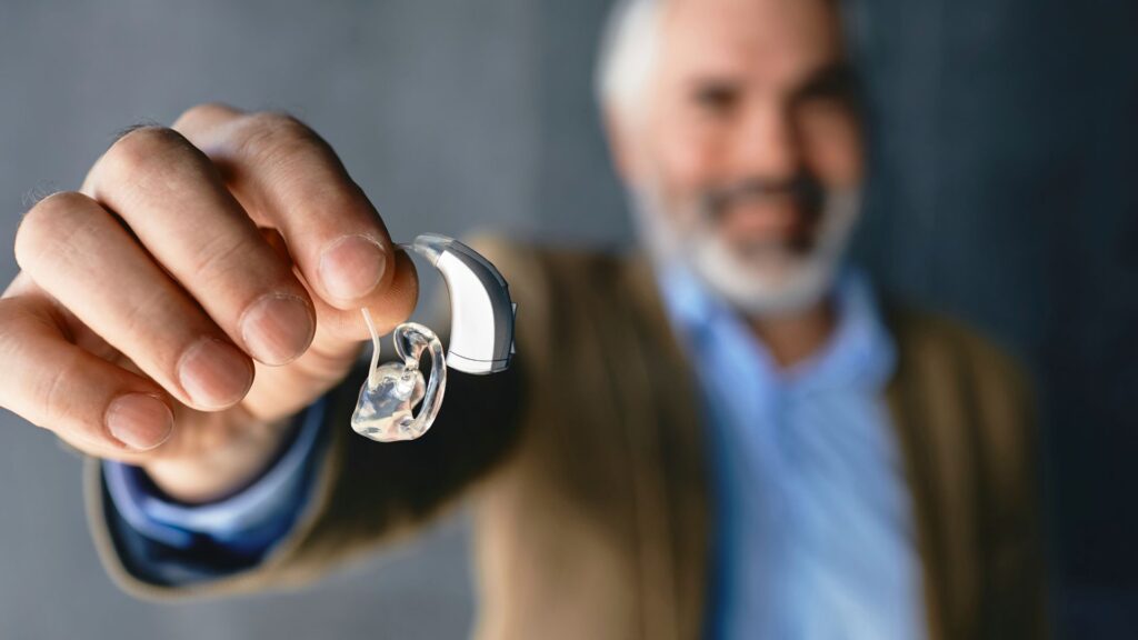 Best hearing aids in Ahmedabad hearing aid types digital BTE RIC audiologist Evara Hospital Dr Neeraj Suri